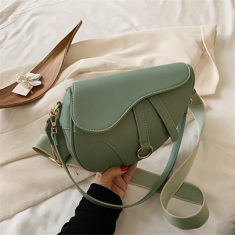 2022 New Women's Bag Leisure Saddle Bag Pu Solid Color Diagonal Bag Fashion Easy Matching Lady Handbags