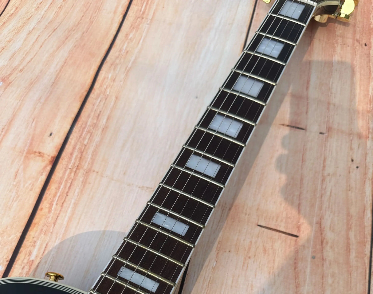 Customized electric guitar, black shiny, gold accessories, imported paint, shiny, available in stock, lightning package