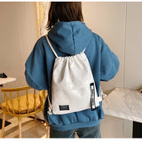 2022 New Women Casual Canvas Drawstring Backpack Men Solid Color Letter Pattern Bag Drawing Straps Closure Fashion Outdoor Bag