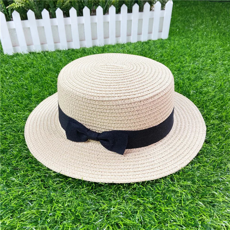 Summer New Women's Sun Hat Bucket cap Ribbon Flat top Straw Hats Beach Caps Panama Women Sun Hat Brim Bowknot  Straw Outdoor Hat