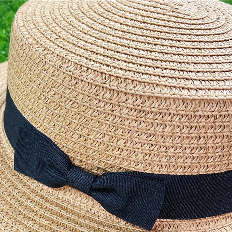 Summer New Women's Sun Hat Bucket cap Ribbon Flat top Straw Hats Beach Caps Panama Women Sun Hat Brim Bowknot  Straw Outdoor Hat