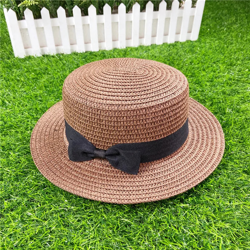 Summer New Women's Sun Hat Bucket cap Ribbon Flat top Straw Hats Beach Caps Panama Women Sun Hat Brim Bowknot  Straw Outdoor Hat