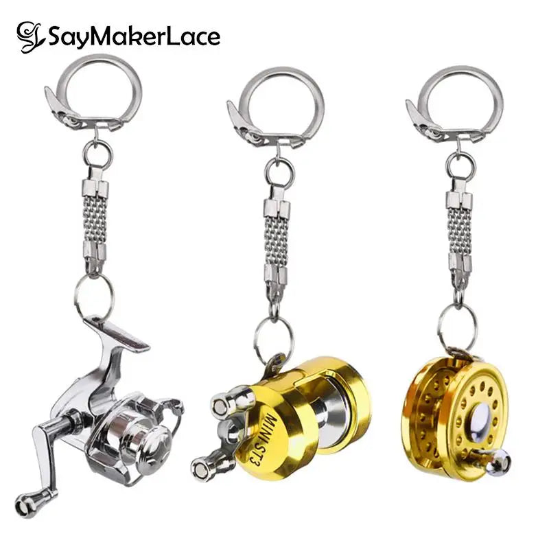 1Pcs Alloy Fishing Reel Drum Pendant Keychain Key Ring Outdoor Small Fishing Tackle Mini Miniature Sea Fishing Spinning Wheel