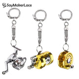 1Pcs Alloy Fishing Reel Drum Pendant Keychain Key Ring Outdoor Small Fishing Tackle Mini Miniature Sea Fishing Spinning Wheel