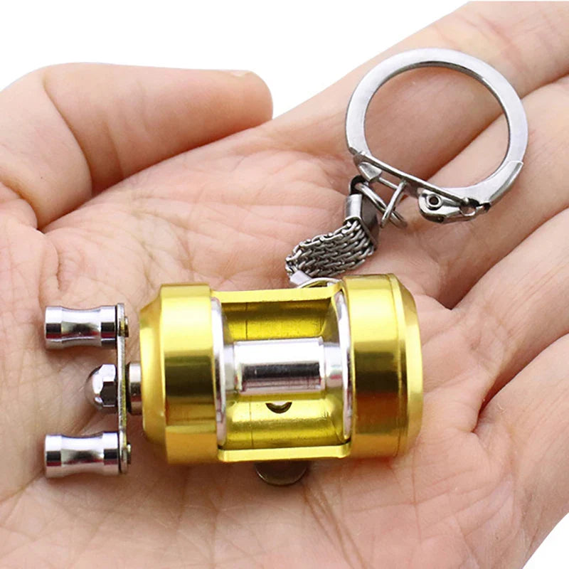 1Pcs Alloy Fishing Reel Drum Pendant Keychain Key Ring Outdoor Small Fishing Tackle Mini Miniature Sea Fishing Spinning Wheel