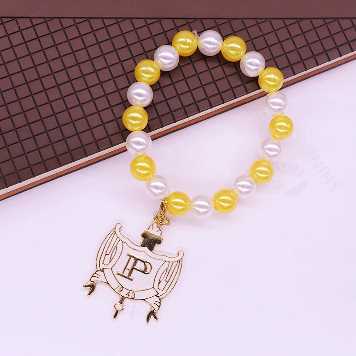 Stylish Stretch Elastic White Yellow Pearl Beads College Group Letter Shield Pendants Philo Bracelets