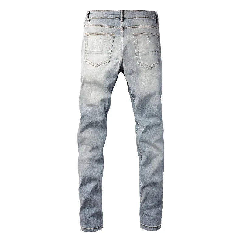 Men Leather Patches Denim Jeans Streetwear Holes Ripped High Stretch Pants Light Blue Skinny Tapered Trousers