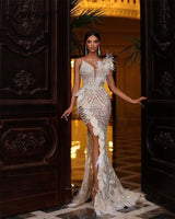 2023 Couture Nude Long Party Dress Arabic Evening Gown Mermaid Feathers Crystals Pearl Dress Pageant Prom Dresses With High Slit