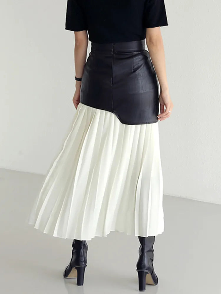 TWOTWINSTYLE Casual Patchwork Pu Skirt For Women High Waist Midi Folds Pleated Skirts Female 2022 Spring Fashion Clothing Style